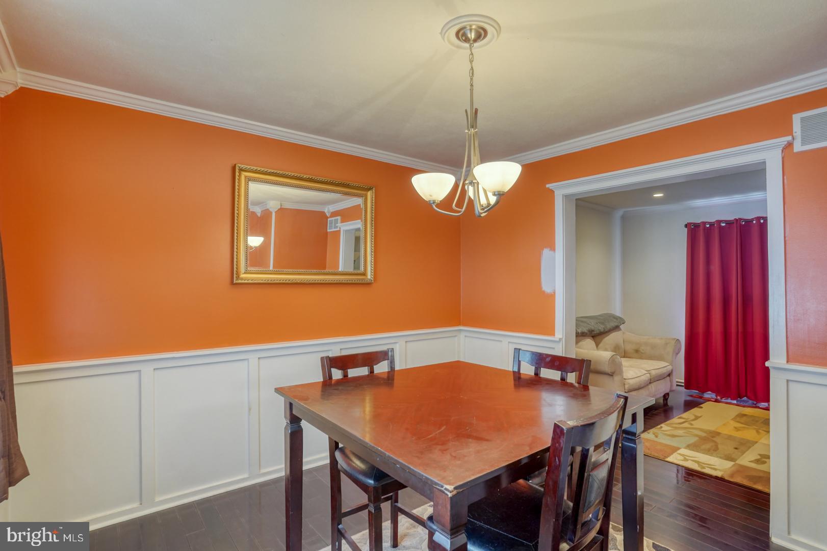 1245 Harrison Drive Dover, DE 19901 - Photo 38 of 47 a view of a dining room with furniture and wooden floor