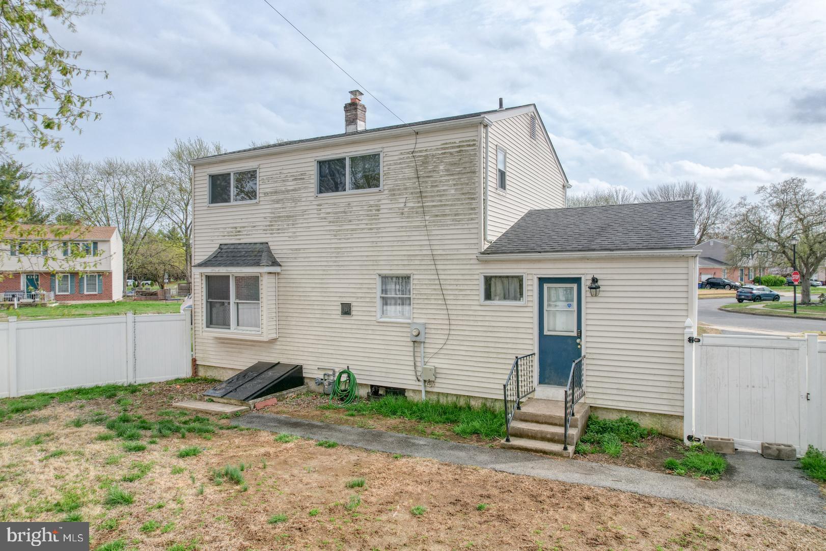 1245 Harrison Drive Dover, DE 19901 - Photo 42 of 47 a front view of a house with garden