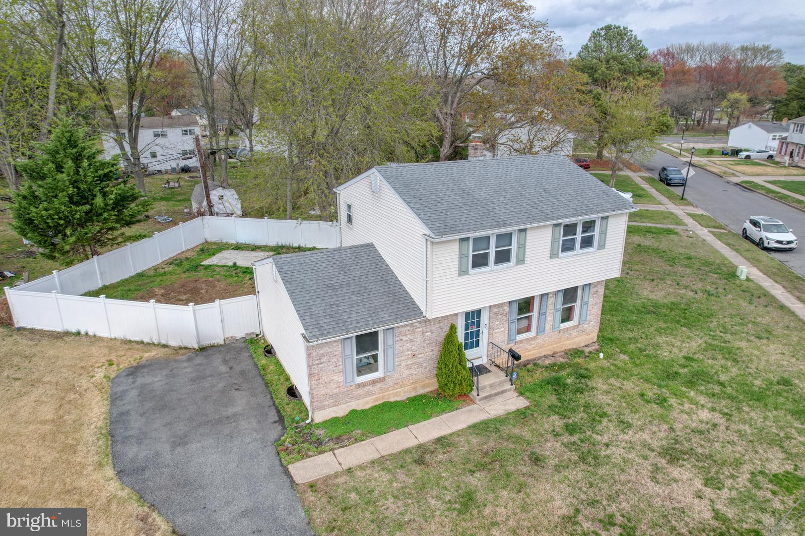 1245 Harrison Drive Dover, DE 19901 - Photo 44 of 47 an aerial view of a house with a yard