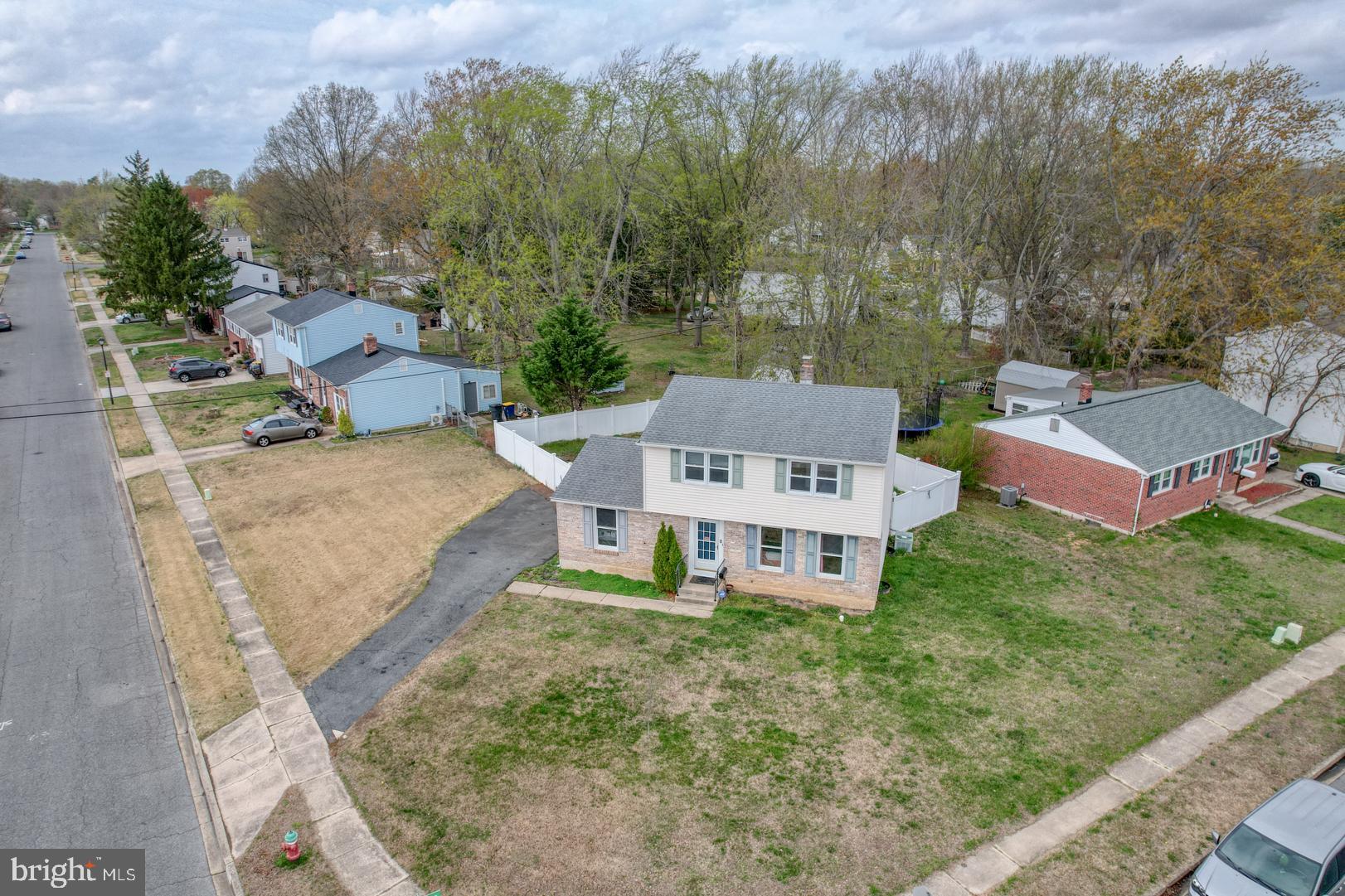 1245 Harrison Drive Dover, DE 19901 - Photo 45 of 47 a view of a house with a yard