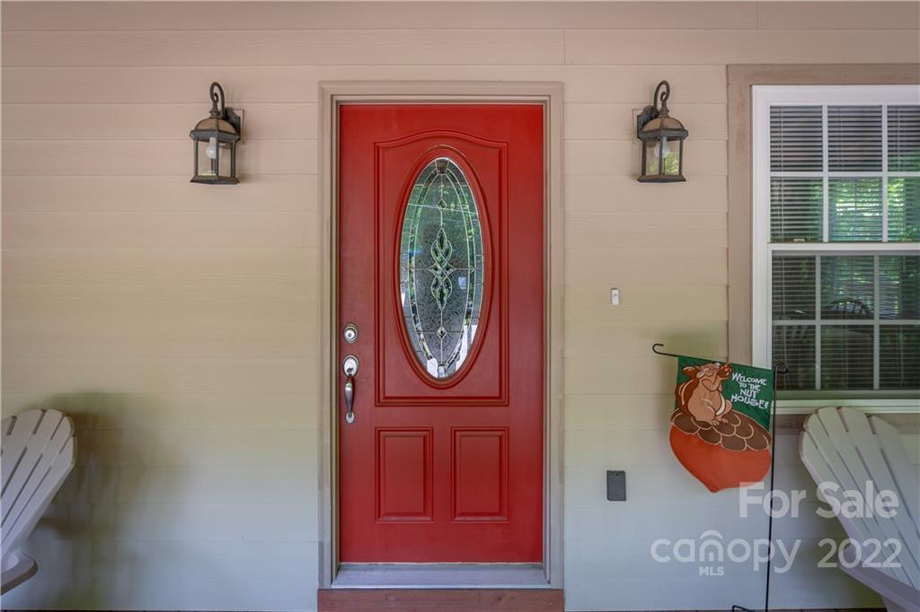 204 Nottingham Road Maggie Valley, NC 28751 - Photo 8 of 46 a front view of a house with entryway