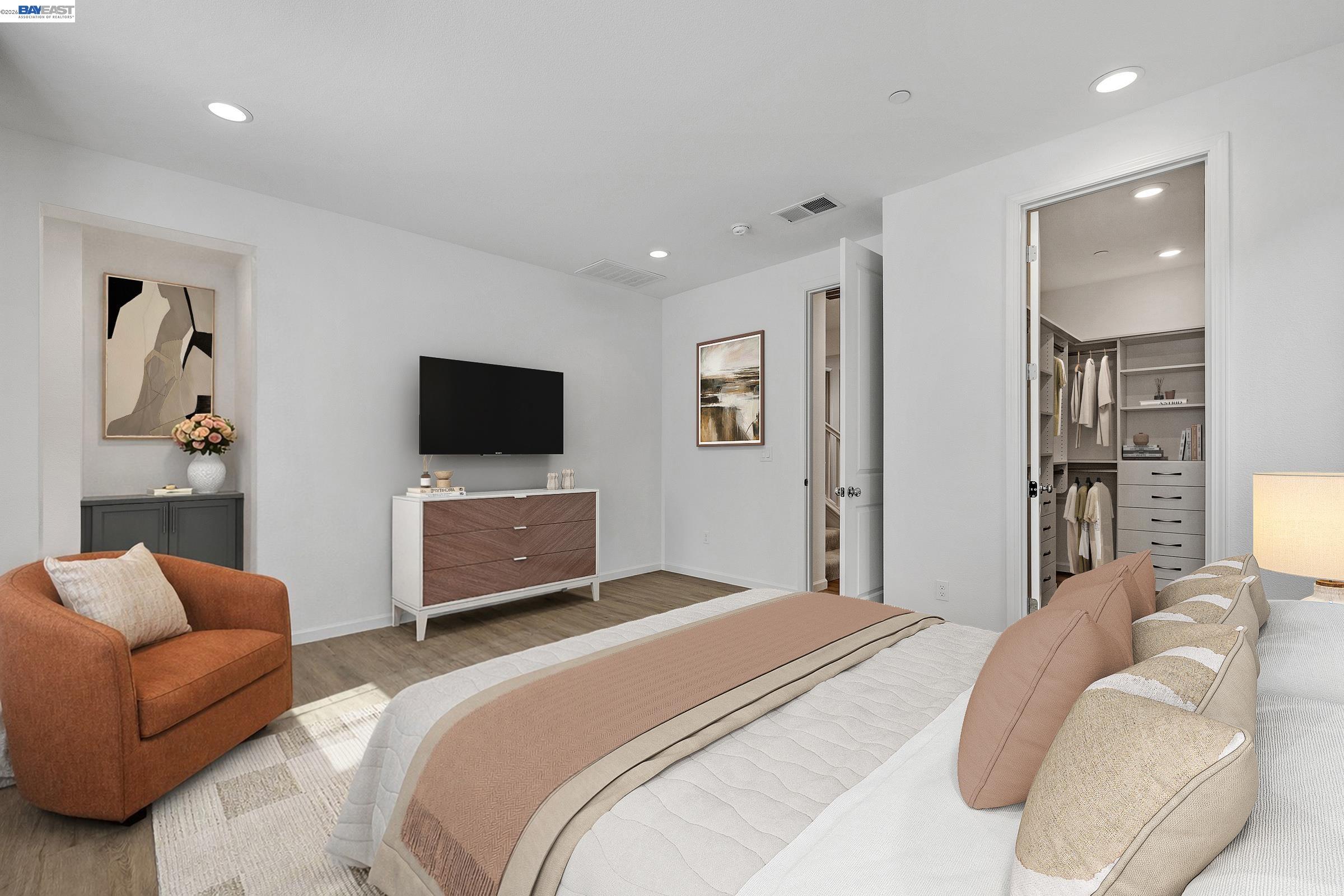 5990 Peridot Place Dublin, CA 94568 - Photo 24 of 43 a bedroom with a bed and a television