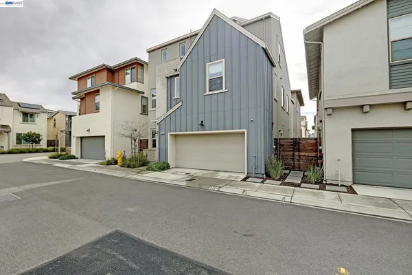 a view of a house with a street