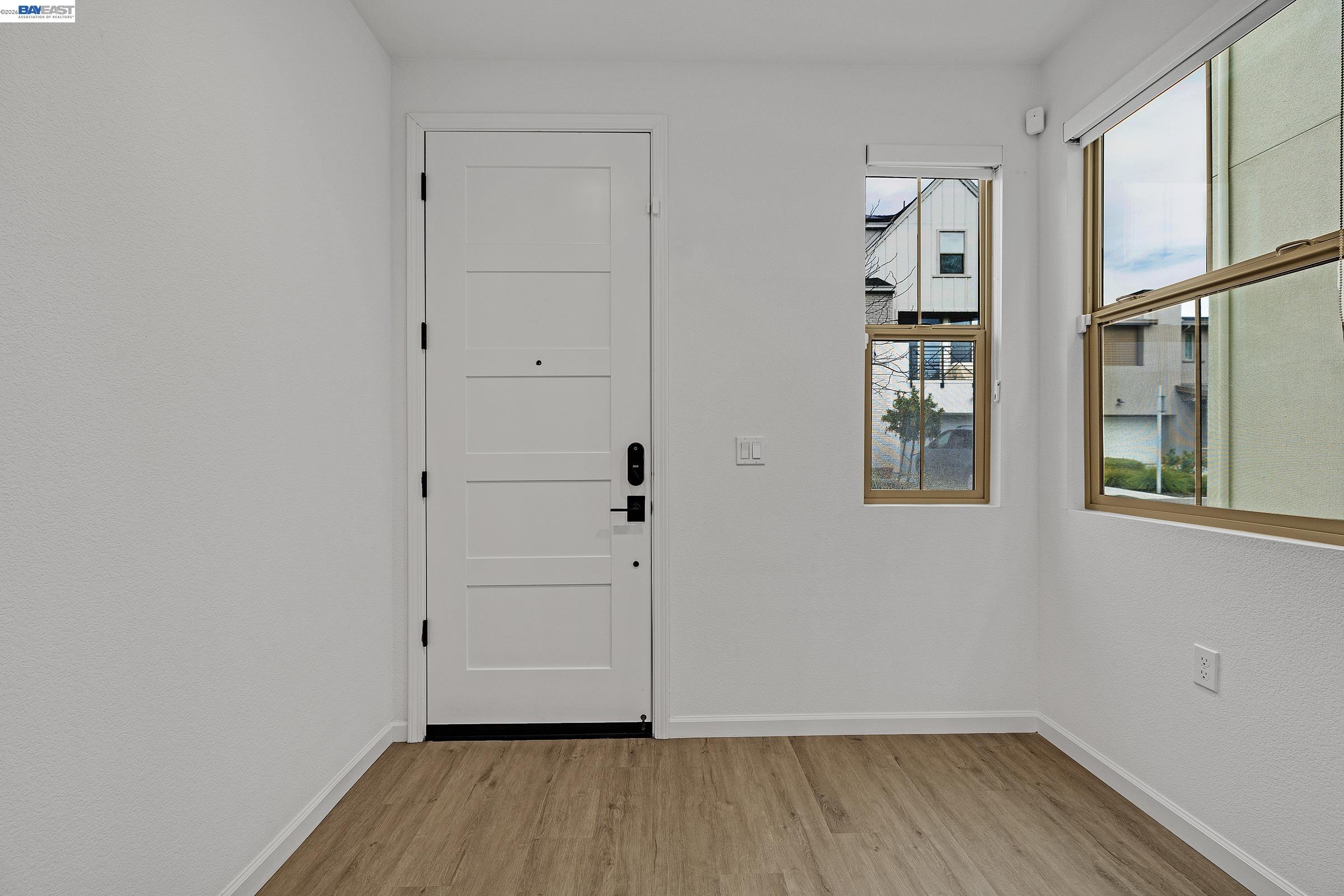 5990 Peridot Place Dublin, CA 94568 - Photo 7 of 43 wooden floor in an empty room with a window