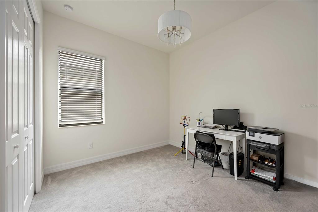 5931 Brandon Run Bradenton, FL 34211 - Photo 15 of 42 a view of a workspace with a window