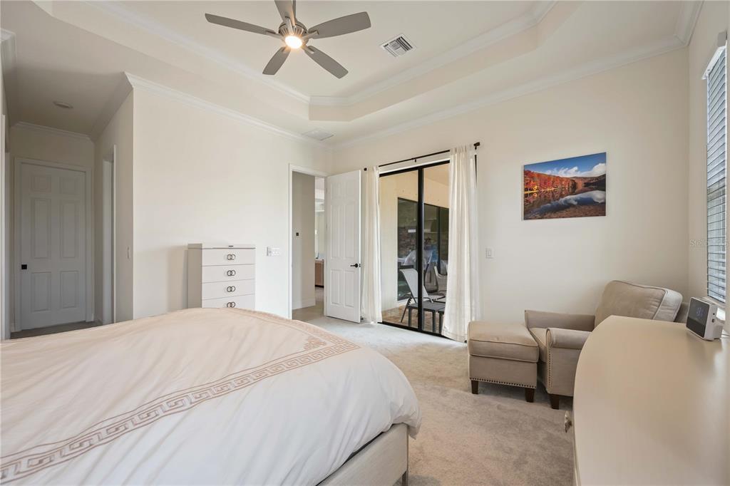 5931 Brandon Run Bradenton, FL 34211 - Photo 19 of 42 a bedroom with a bed and a couch