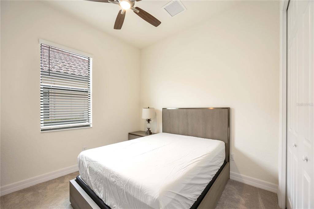 5931 Brandon Run Bradenton, FL 34211 - Photo 20 of 42 a bedroom with a bed and window