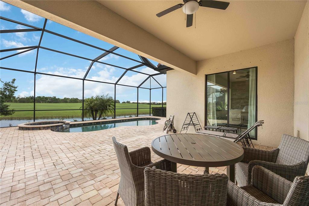 5931 Brandon Run Bradenton, FL 34211 - Photo 27 of 42 a dining room with furniture and a window