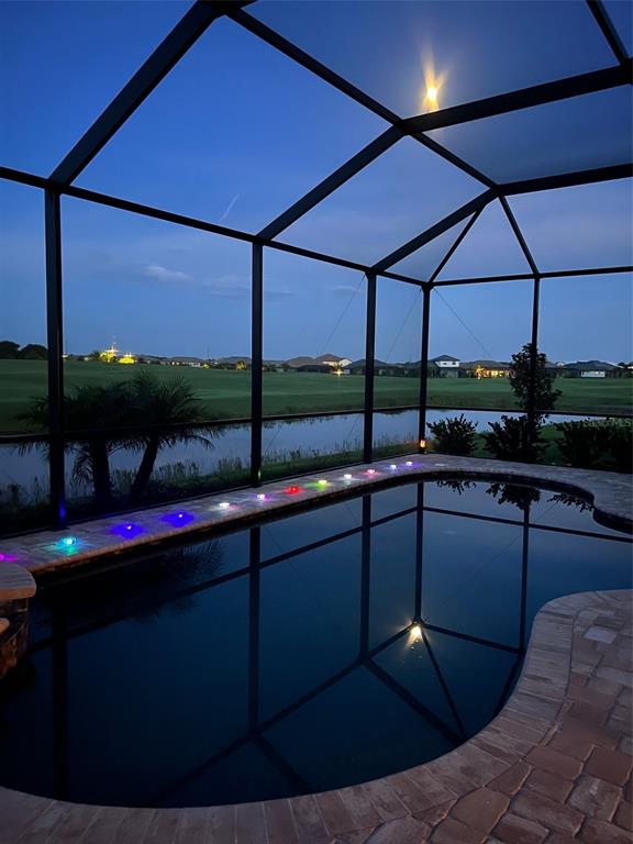 5931 Brandon Run Bradenton, FL 34211 - Photo 29 of 42 a kitchen with a sink and cabinets