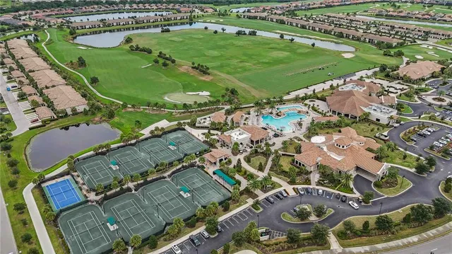 an aerial view of a swimming pool and outdoor space