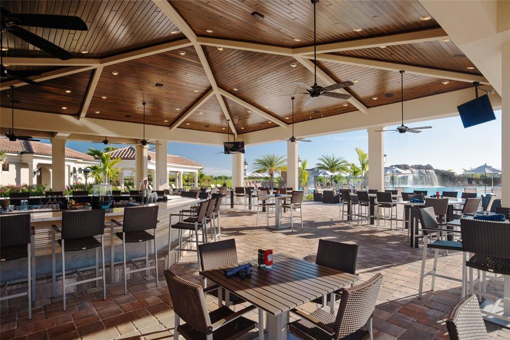 5931 Brandon Run Bradenton, FL 34211 - Photo 38 of 42 a view of a dinning table and chairs in the patio