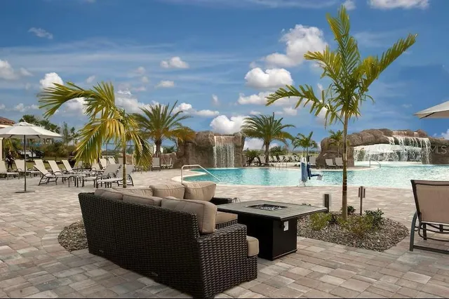 a view of outdoor space with swimming pool