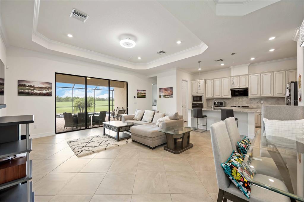 5931 Brandon Run Bradenton, FL 34211 - Photo 5 of 42 a living room with furniture and a large window