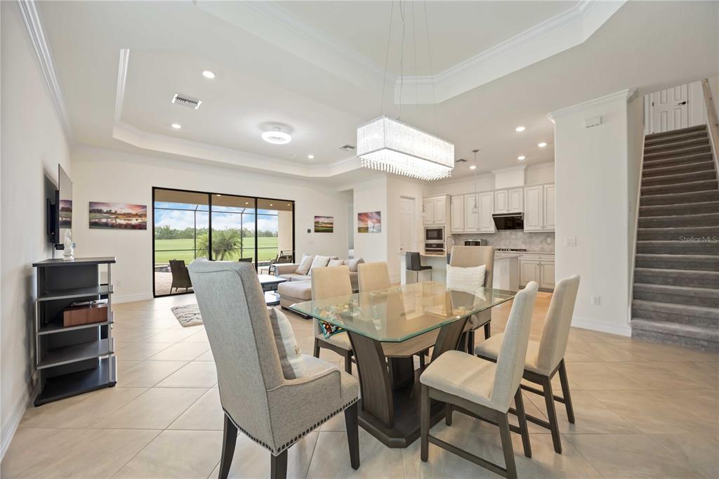 5931 Brandon Run Bradenton, FL 34211 - Photo 8 of 42 a view of a dining room with furniture