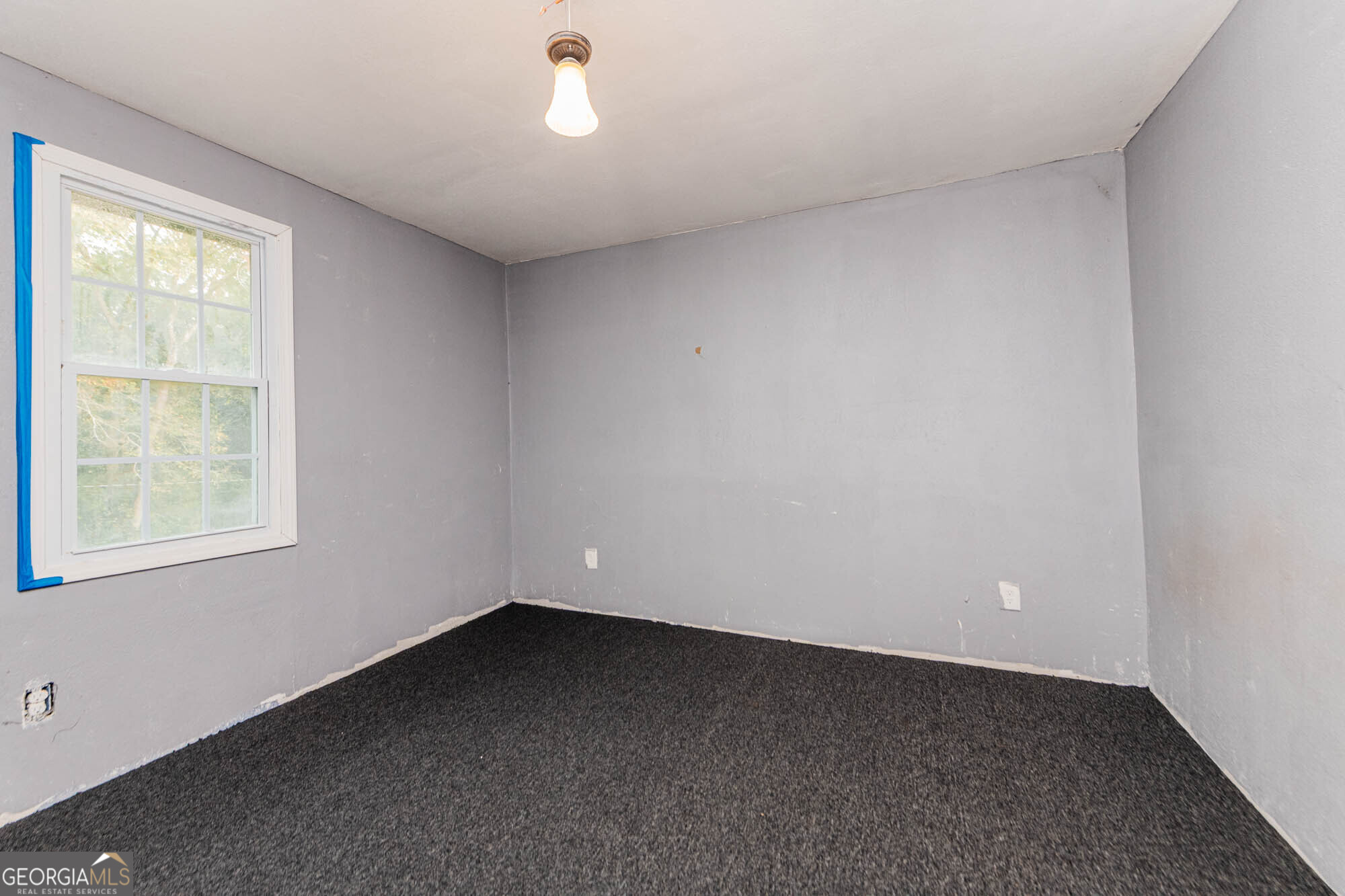 3706 Riggins Mill Road Macon, GA 31217 - Photo 15 of 30 an empty room with a window