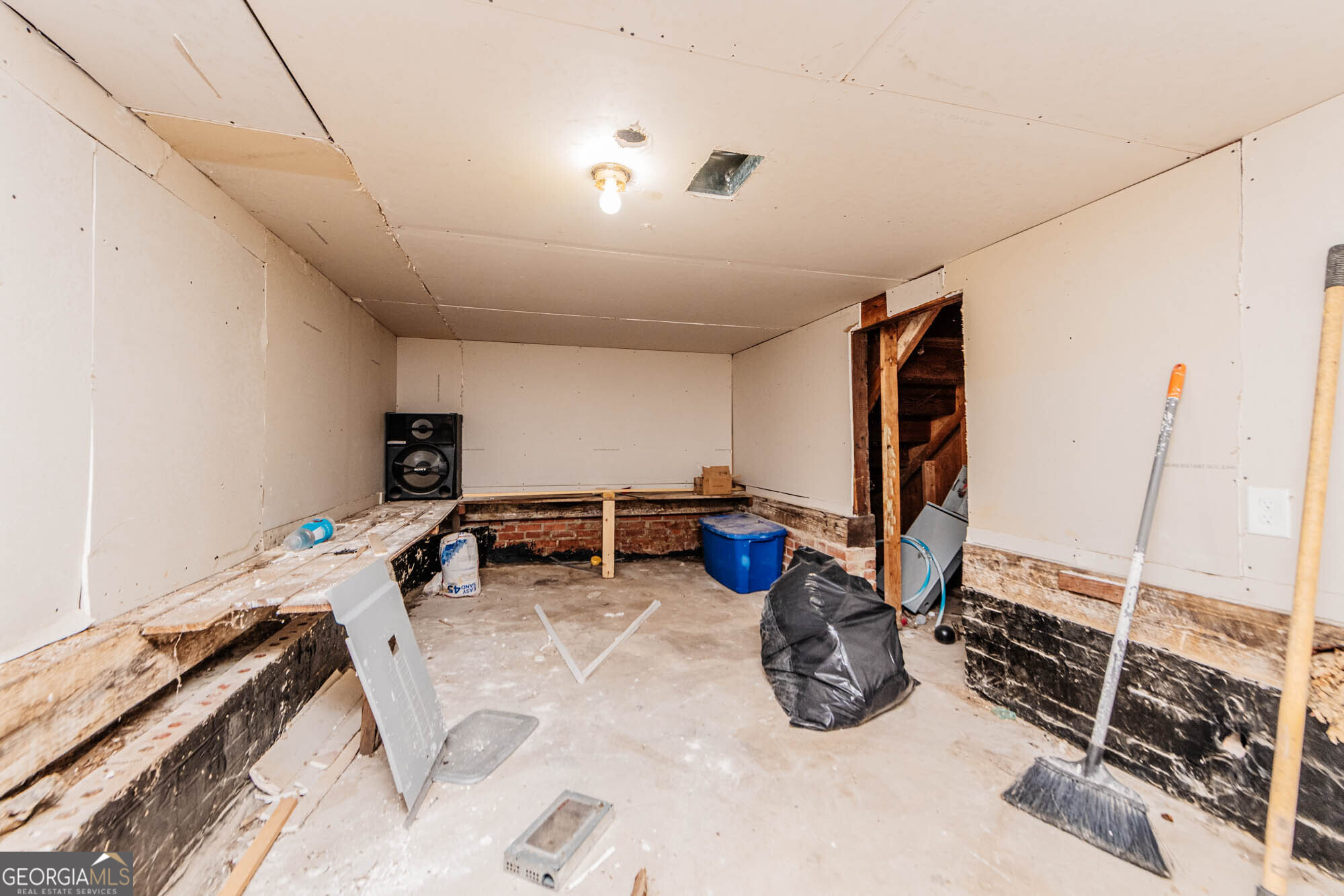 3706 Riggins Mill Road Macon, GA 31217 - Photo 24 of 30 a room with furniture and a flat screen tv