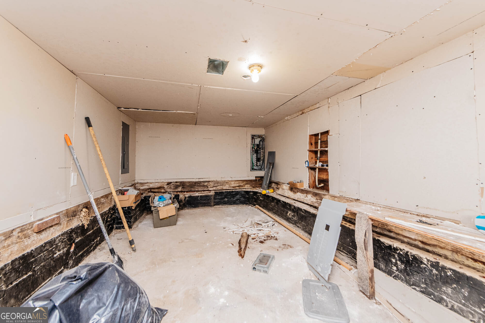 3706 Riggins Mill Road Macon, GA 31217 - Photo 25 of 30 a bathroom with a sink and a mirror