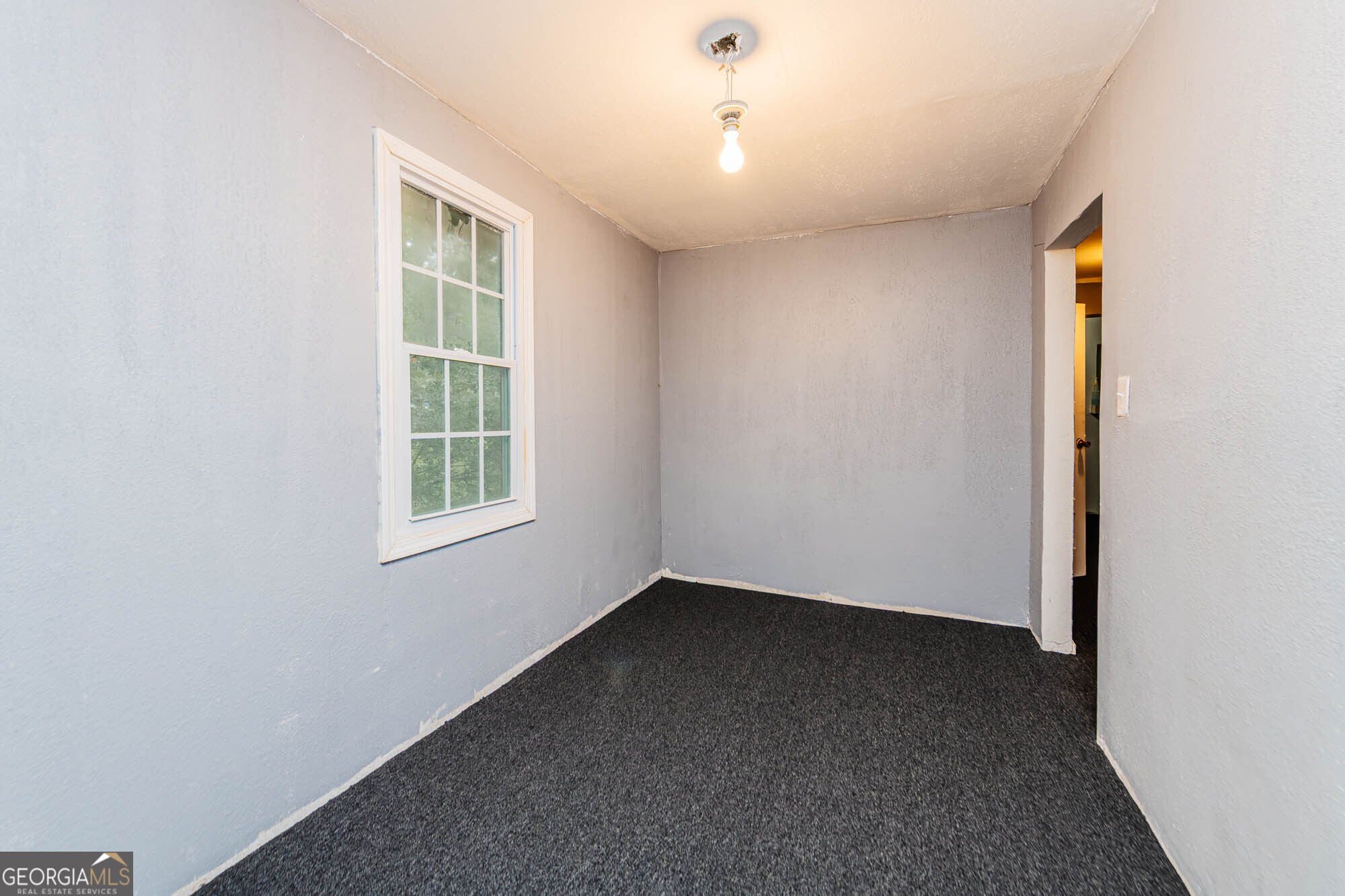 3706 Riggins Mill Road Macon, GA 31217 - Photo 10 of 30 an empty room with windows