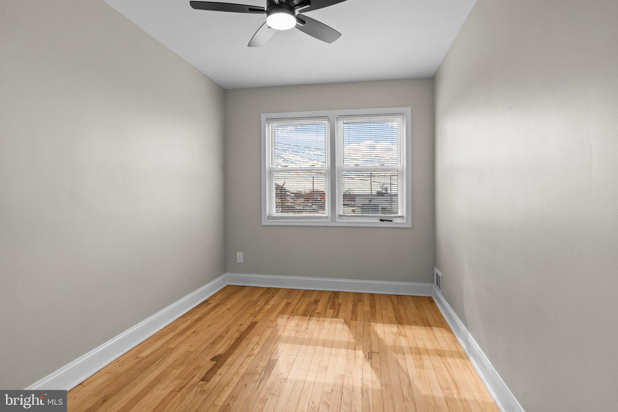 6929 Bank Street Baltimore, MD 21224 - Photo 20 of 30 an empty room with a window