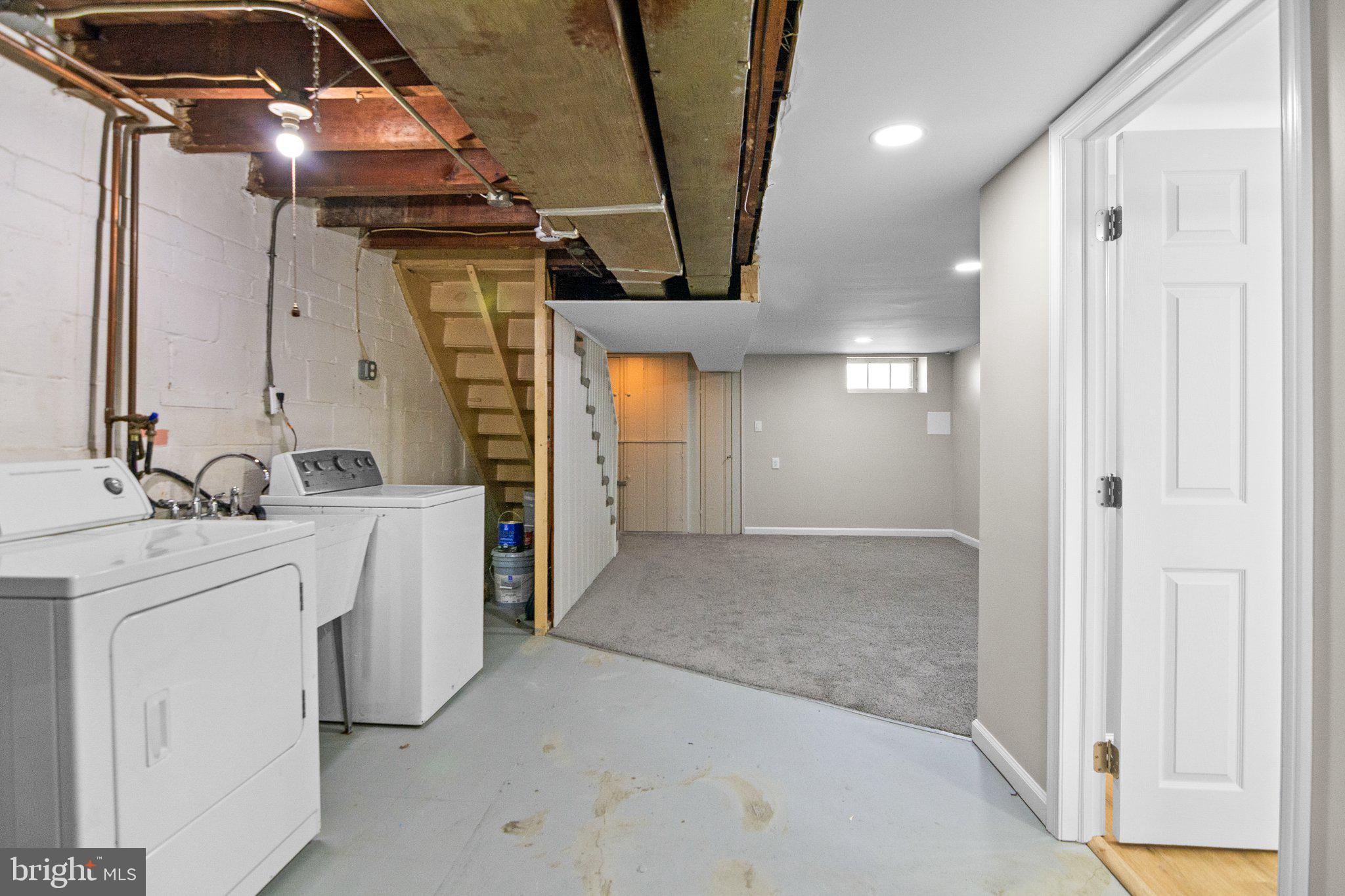 6929 Bank Street Baltimore, MD 21224 - Photo 25 of 30 a view of a utility room with closet and windows