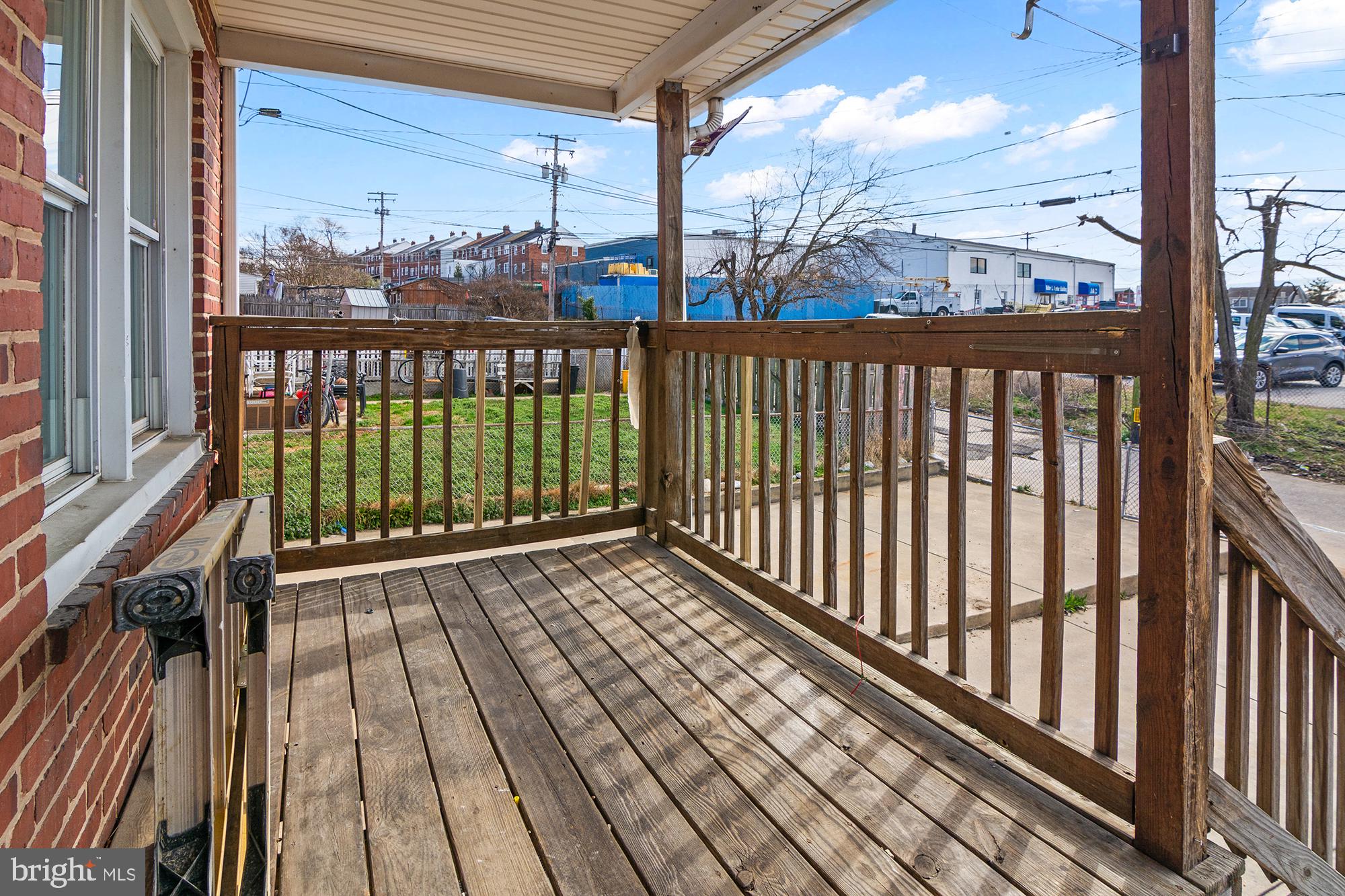 6929 Bank Street Baltimore, MD 21224 - Photo 28 of 30 a view of a balcony with wooden floor