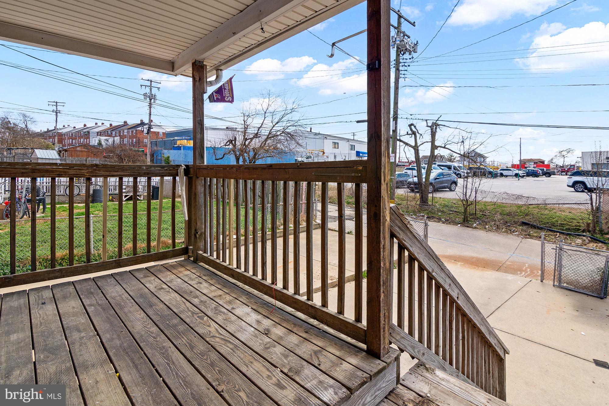 6929 Bank Street Baltimore, MD 21224 - Photo 29 of 30 a view of a balcony with wooden floor