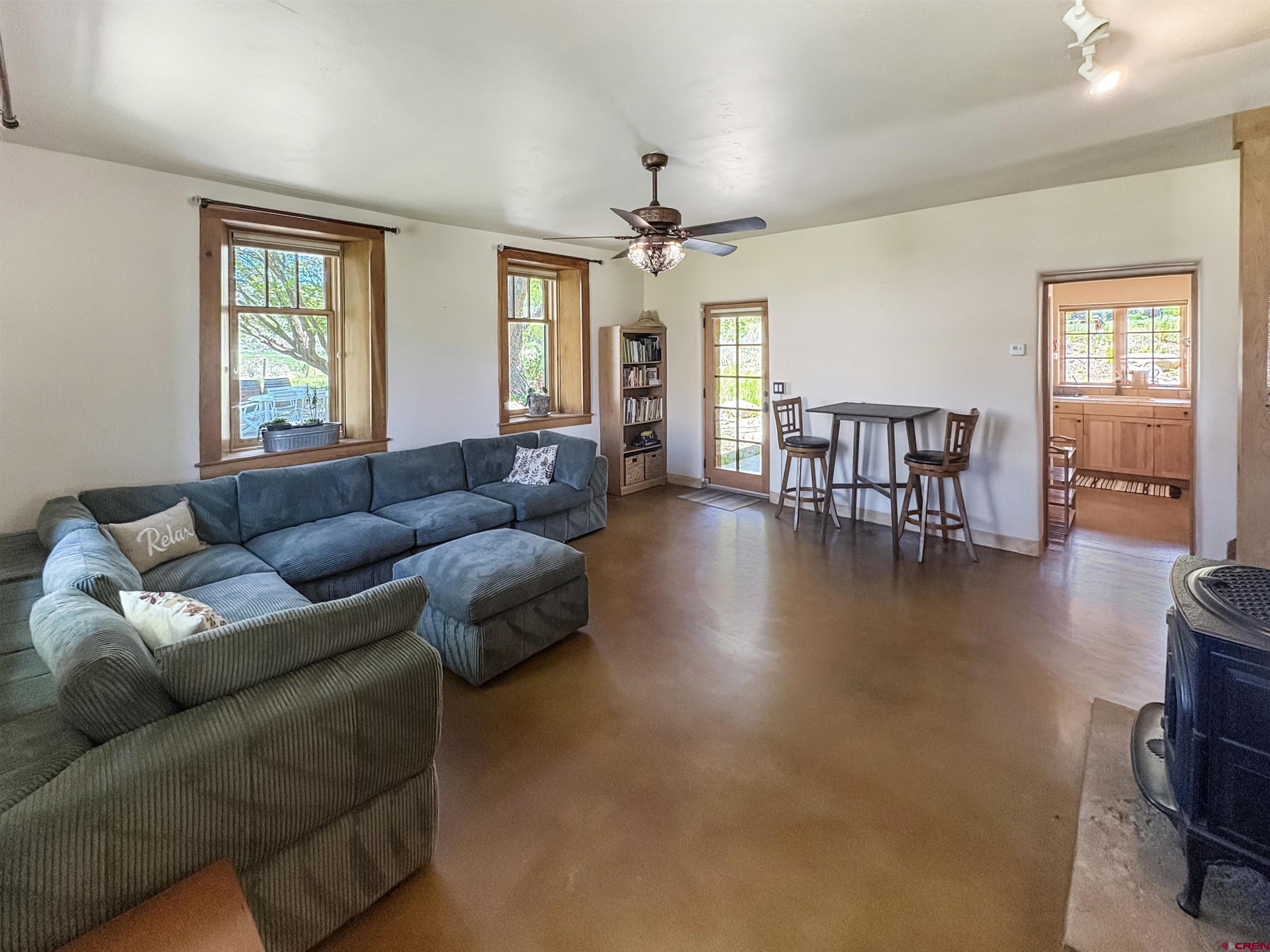 18261 Rd G Cortez, CO 81321 - Photo 16 of 45 a living room with furniture window and wooden floor