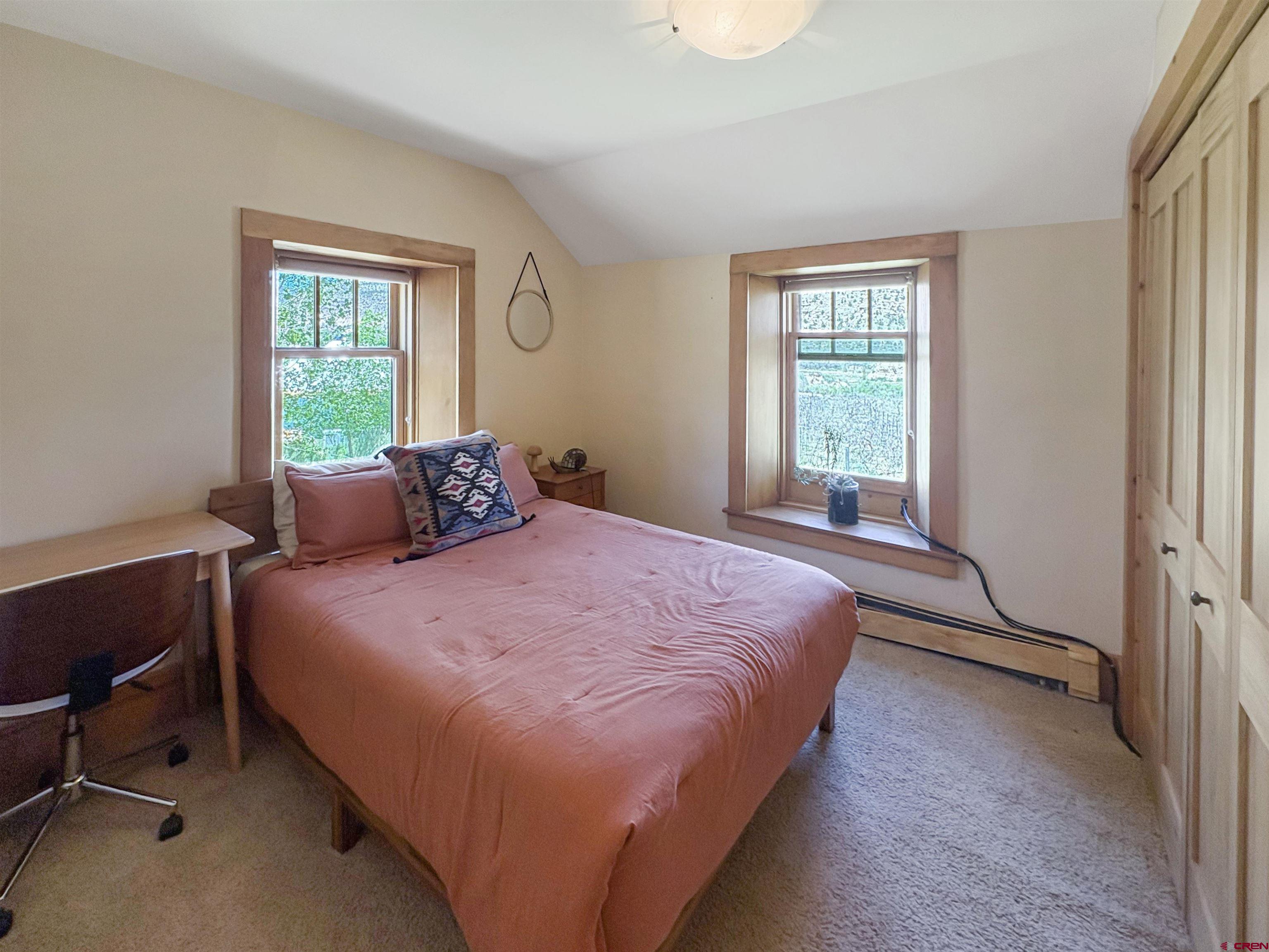 18261 Rd G Cortez, CO 81321 - Photo 19 of 45 a bedroom with a bed and window