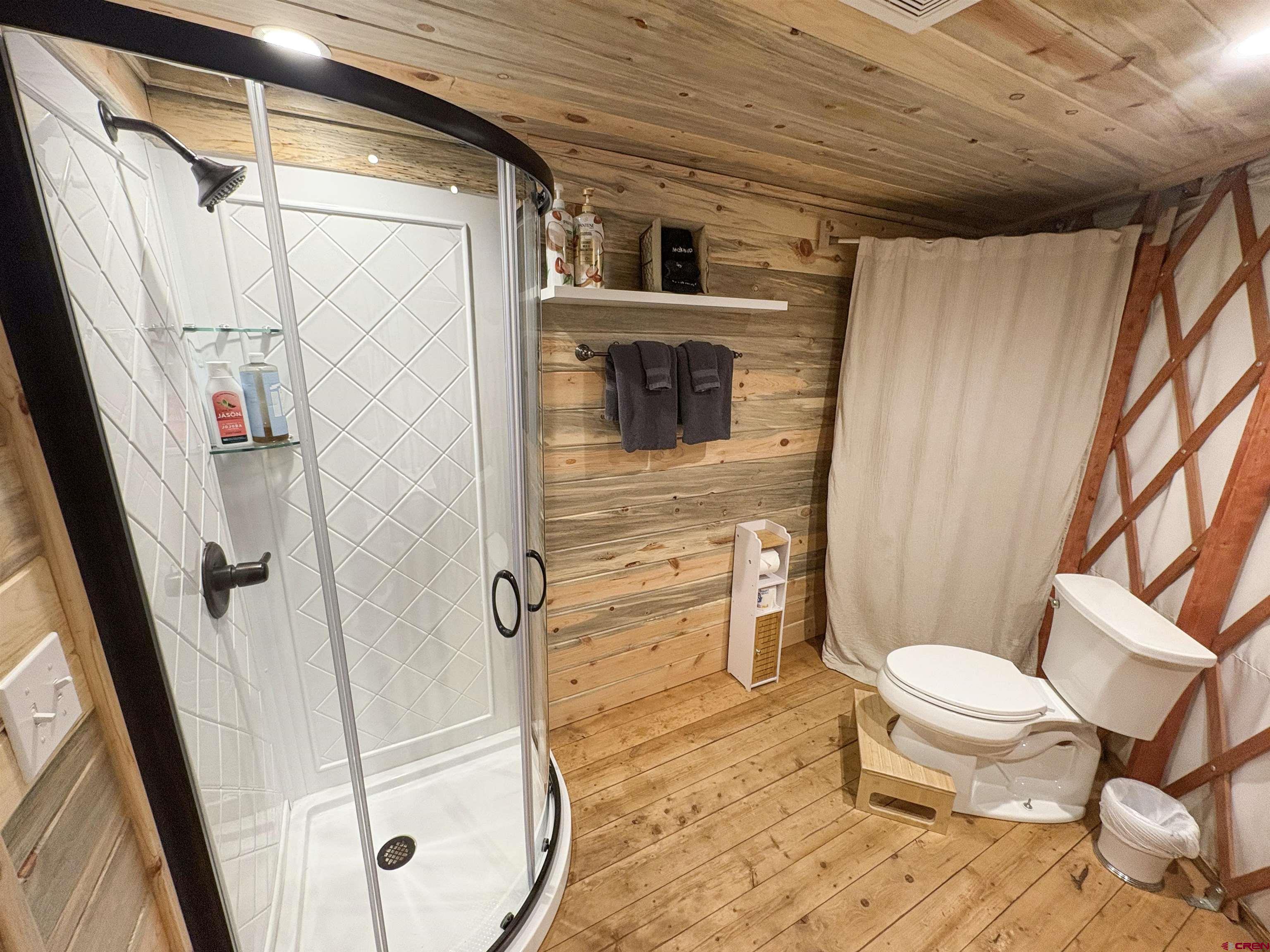 18261 Rd G Cortez, CO 81321 - Photo 30 of 44 a bathroom with a toilet and a shower