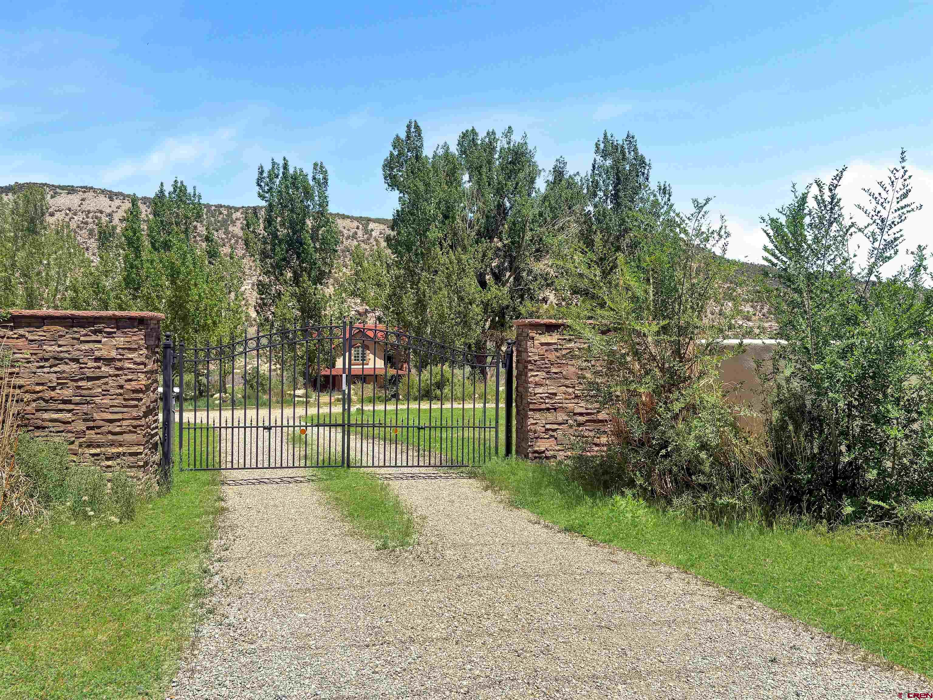 18261 Rd G Cortez, CO 81321 - Photo 43 of 45 a view of a park with large trees and a small yard