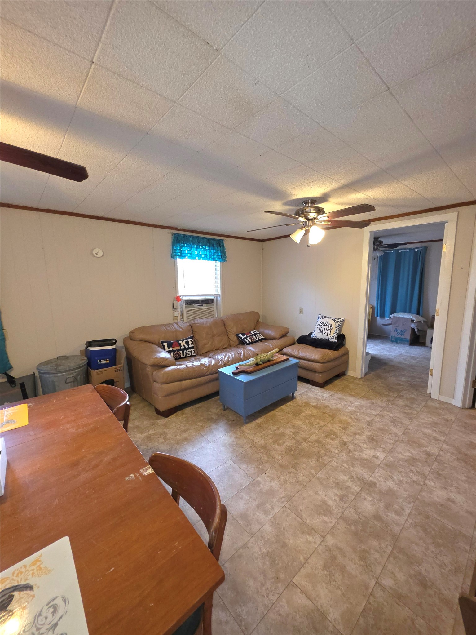 978 County Road 2859 Cleveland, TX 77327 - Photo 31 of 50 a bedroom with furniture and a rug