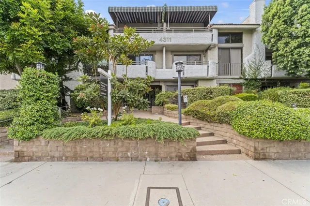 a porch with seating space and yard