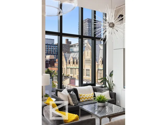 a view of a terrace with sitting area