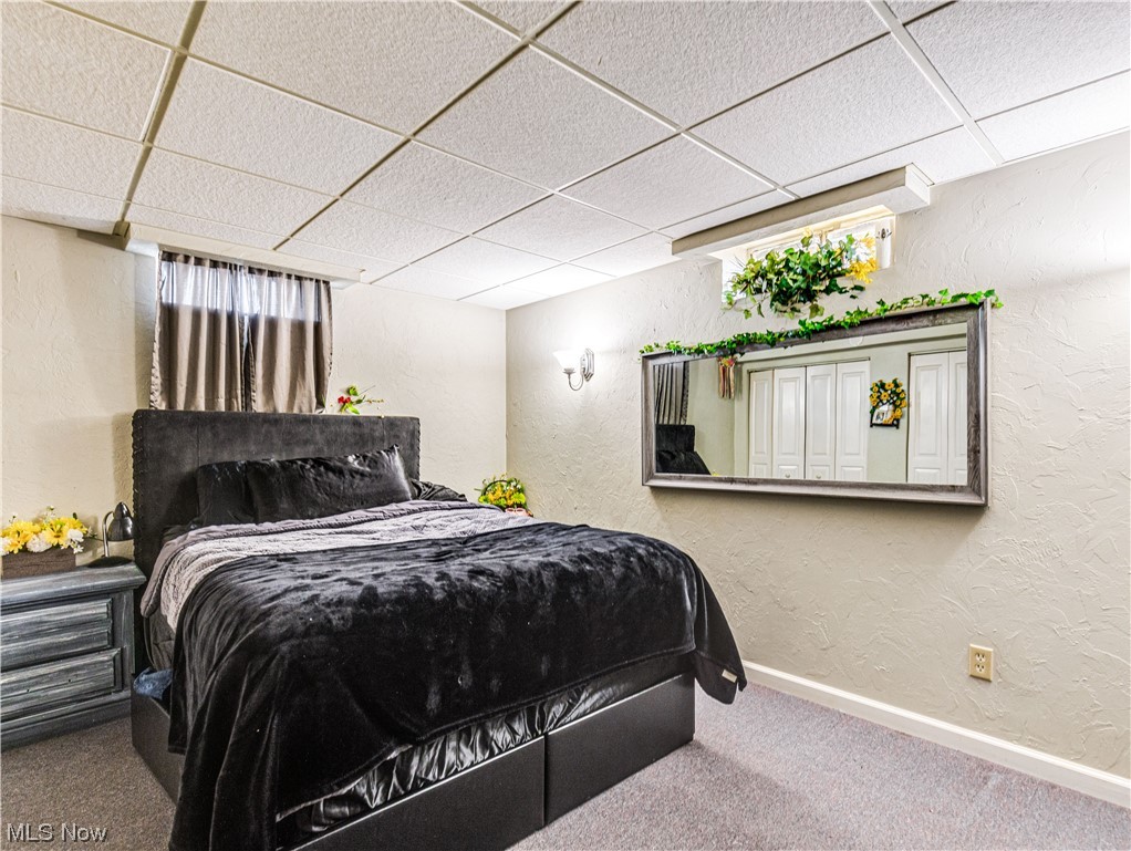 2420 Igleheart Road Akron, OH 44312 - Photo 25 of 31 Carpeted bonus room featuring a drop ceiling