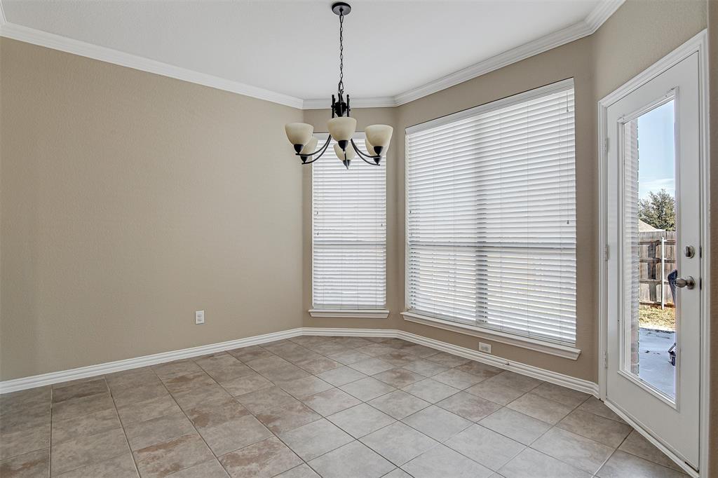 328 Tioga Street Burleson, TX 76028 - Photo 12 of 29 a view of an empty room with a window
