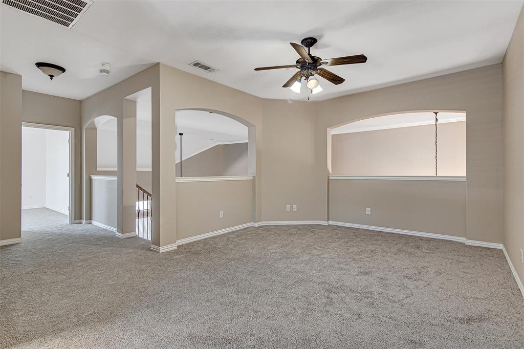 328 Tioga Street Burleson, TX 76028 - Photo 18 of 29 an empty room with closet and windows