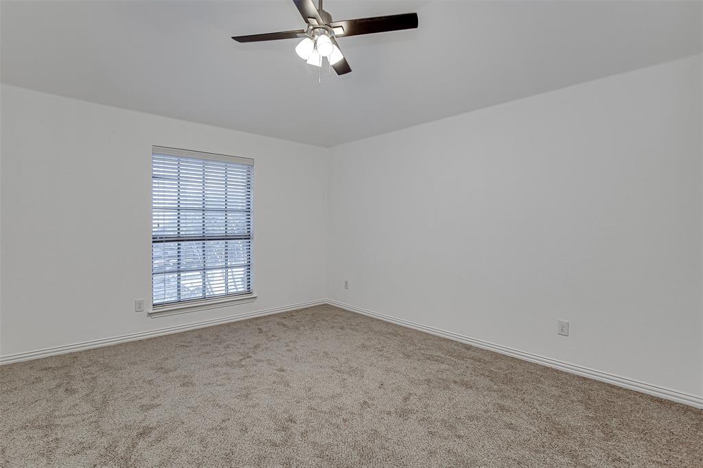 328 Tioga Street Burleson, TX 76028 - Photo 25 of 29 an empty room with windows