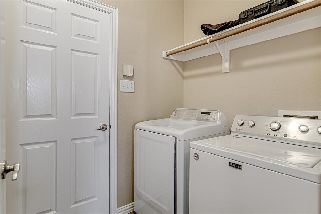 328 Tioga Street Burleson, TX 76028 - Photo 27 of 29 a utility room with dryer and washer