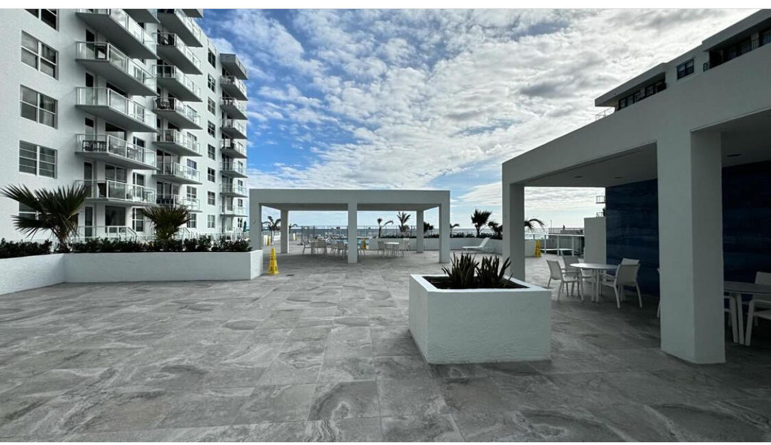 3450 South Ocean Boulevard, Unit 708 Palm Beach, FL 33480 - Photo 27 of 33 Pool Deck & outdoor kitchen