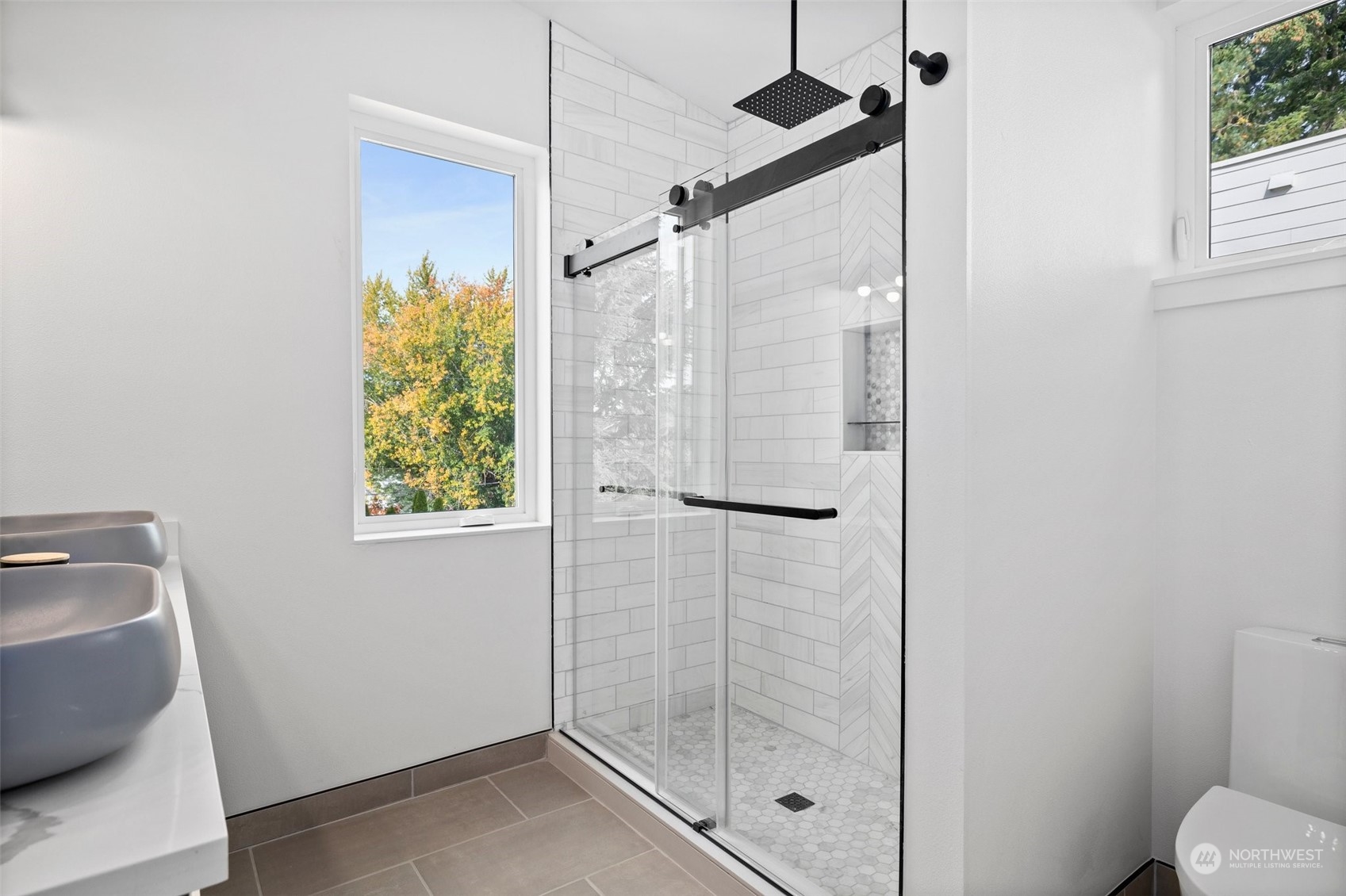 8451 24th Avenue Southwest, Unit B Seattle, WA 98106 - Photo 14 of 20 a bathroom with a shower
