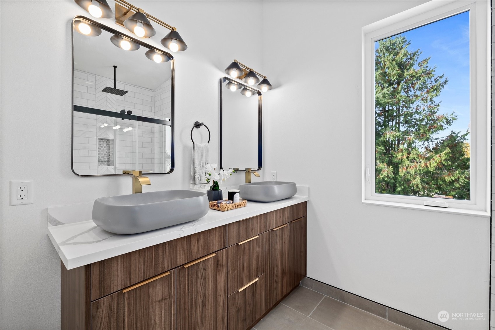 8451 24th Avenue Southwest, Unit B Seattle, WA 98106 - Photo 15 of 20 a bathroom with a sink and a mirror