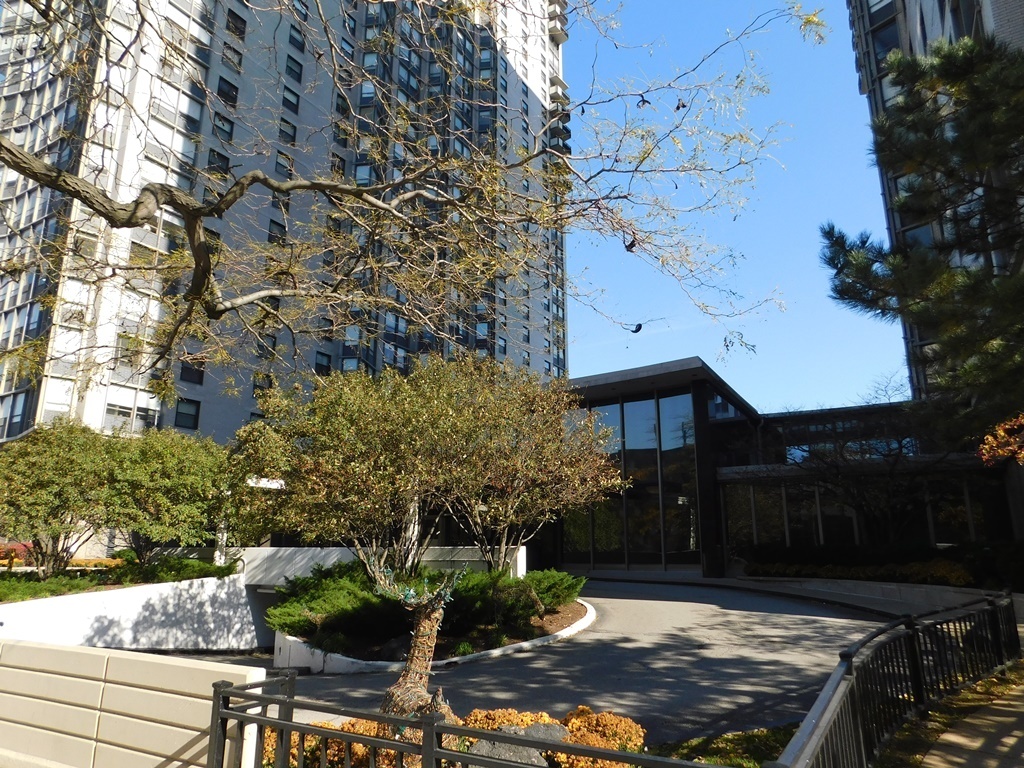 5701 North Sheridan Road, Unit 12L Chicago, IL 60660 - Photo 2 of 42 a view of house with yard