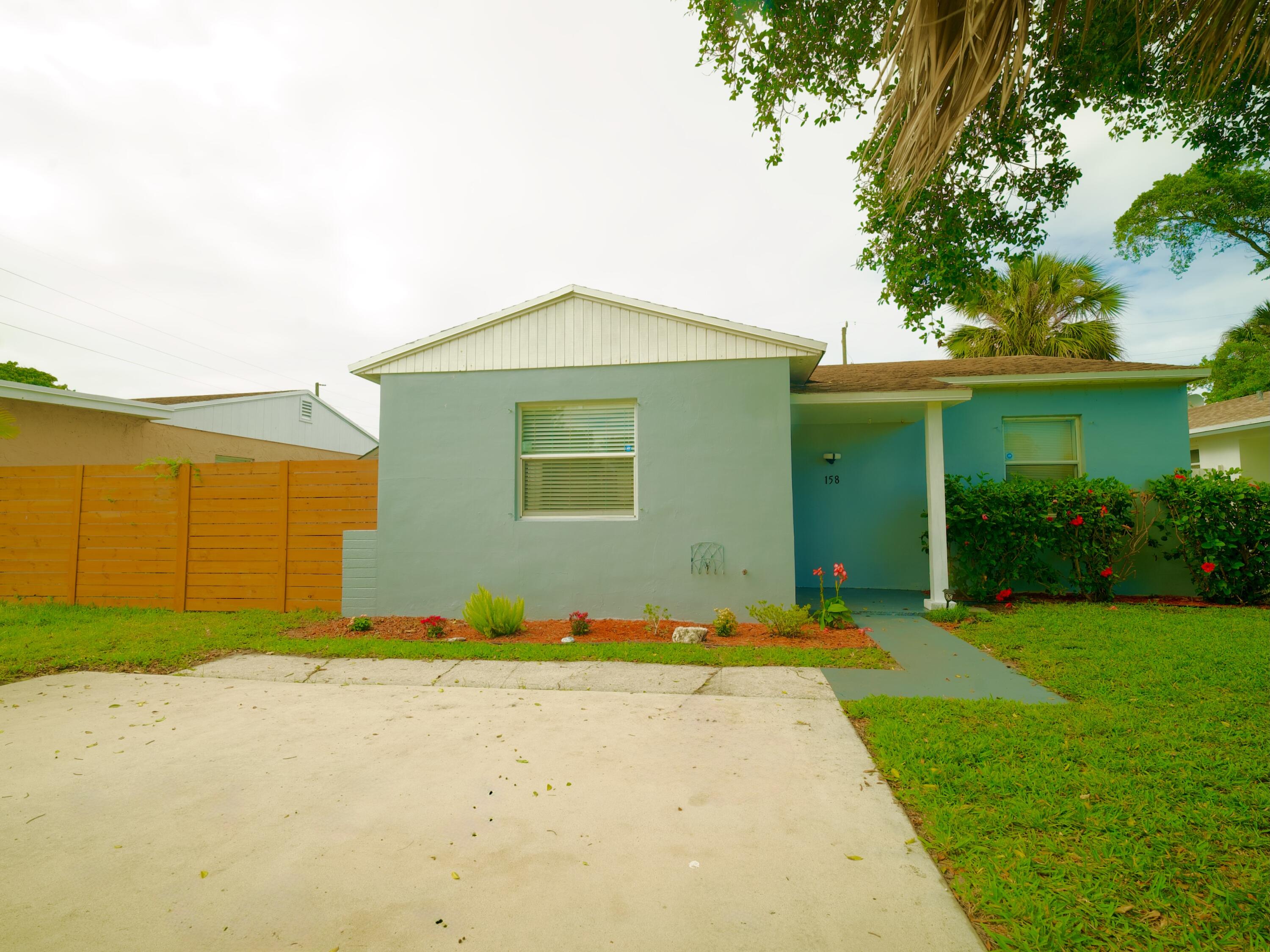158 West 25th Street Riviera Beach, FL 33404 - Photo 1 of 24 43 - 1