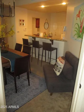 a view of a dining room with furniture