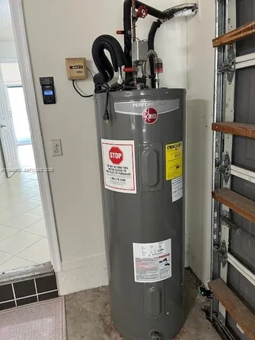 a view of a swimming pool and trees in the back yard