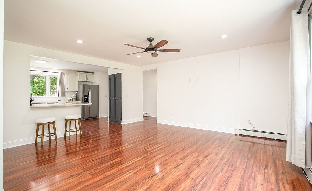 84 Clark Road Sturbridge, MA 01518 - Photo 12 of 30 a view of an empty room and wooden floor