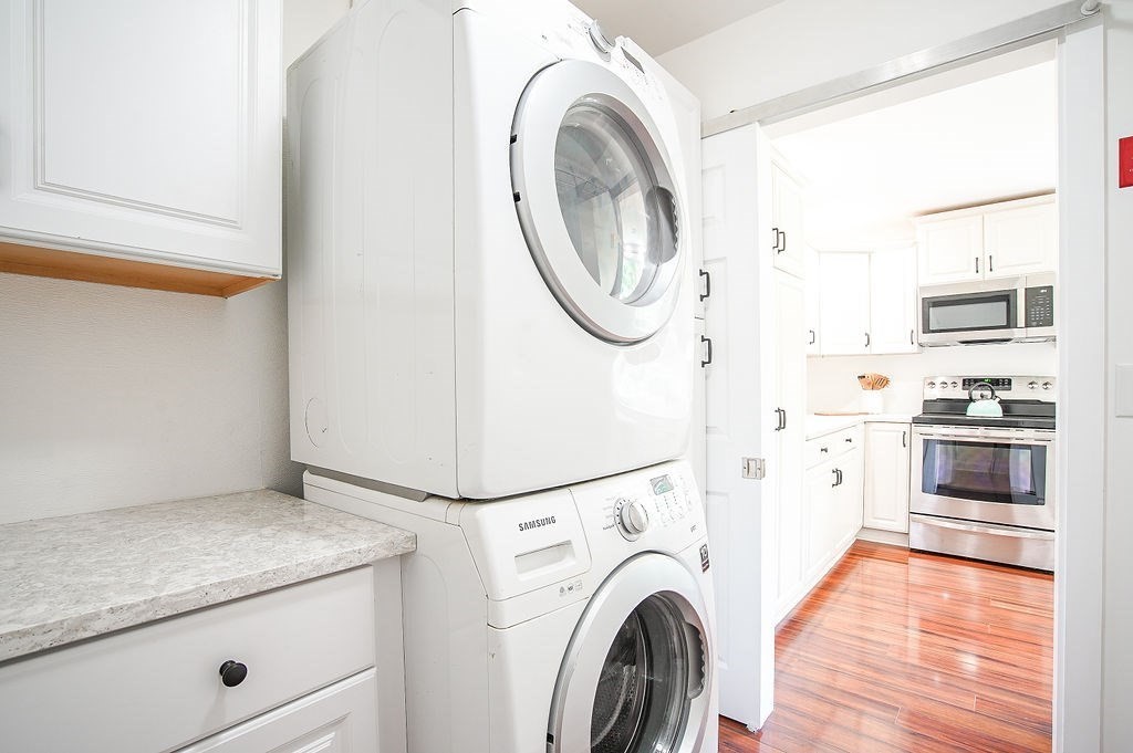 84 Clark Road Sturbridge, MA 01518 - Photo 16 of 30 a kitchen with a washer and dryer