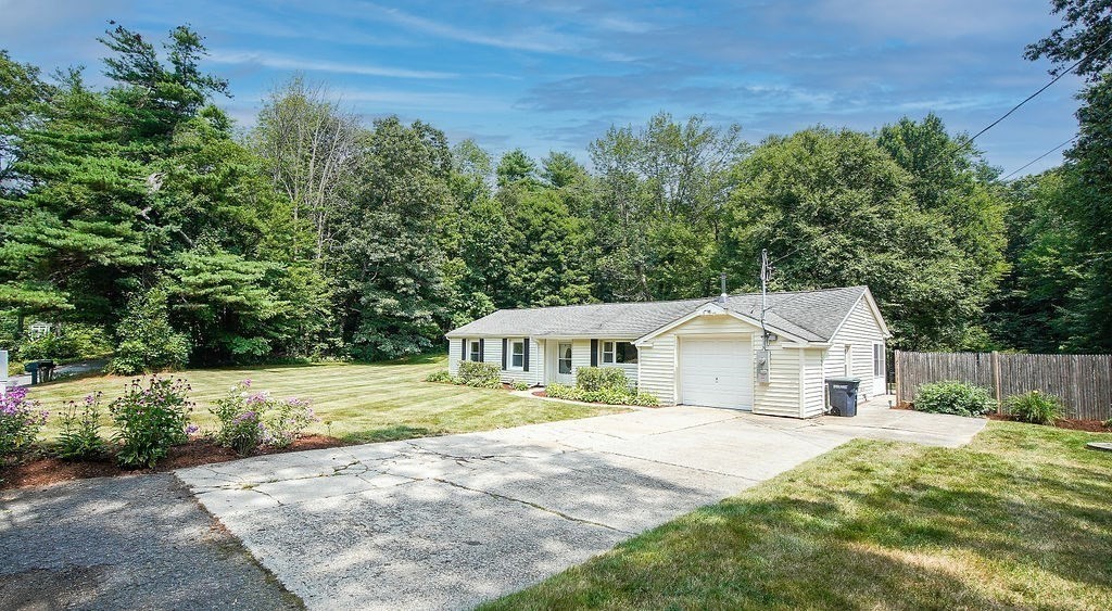 84 Clark Road Sturbridge, MA 01518 - Photo 30 of 30 a house with a yard in front of it