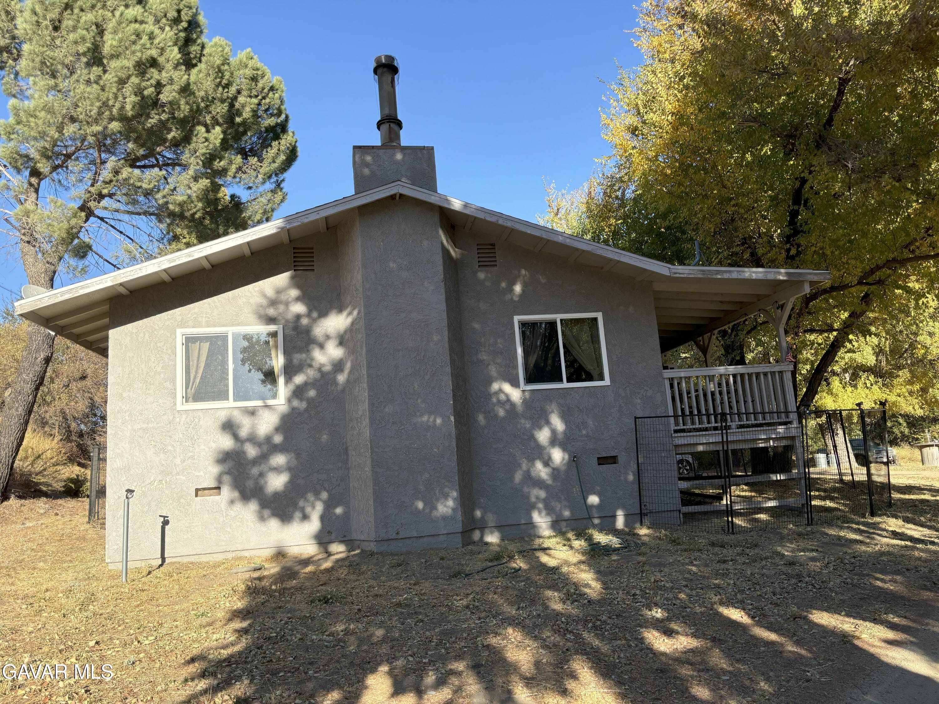 42930 Lake Hughes Road Lake Hughes, CA 93532 - Photo 29 of 38 a view of a house with a yard