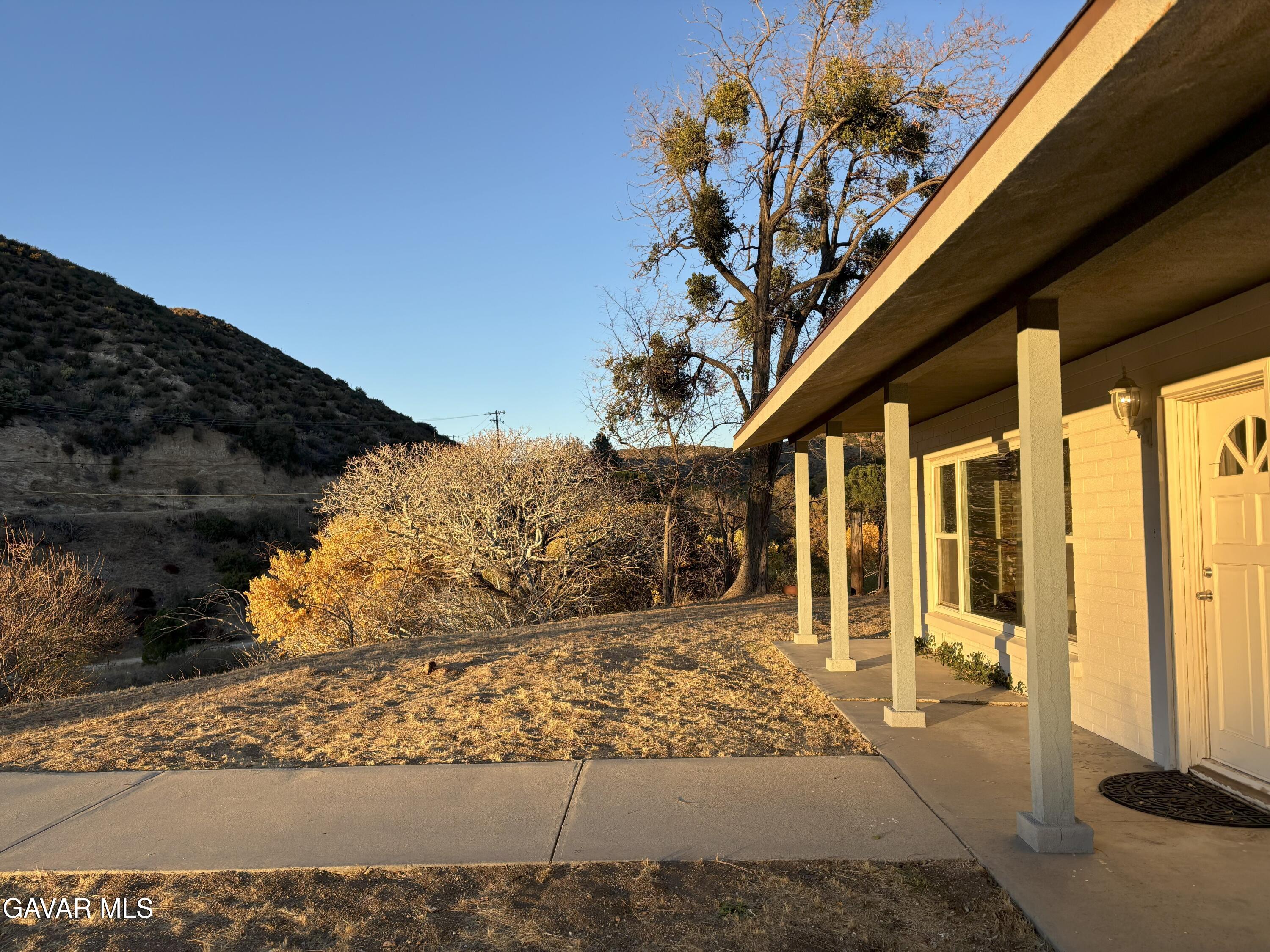 42930 Lake Hughes Road Lake Hughes, CA 93532 - Photo 7 of 38 a view of a pathway of the house